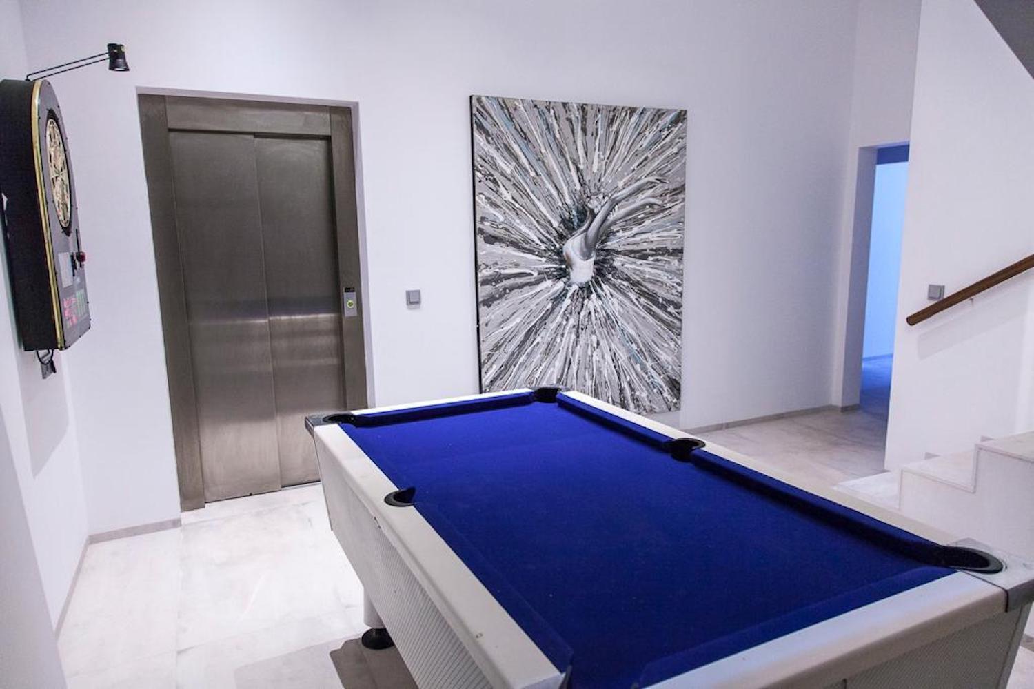 Resa estates Ibiza modern villa Cala llonga golf sale te koop playroom.jpg